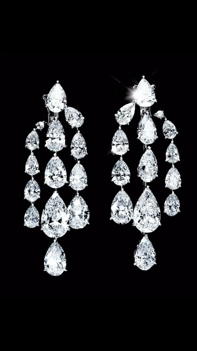 Waterfall diamond earrings by Moussaieff. Over 53 carats D/E/F color diamonds creating one of the most flattering pair of earrings. #moussaieffdiamonds