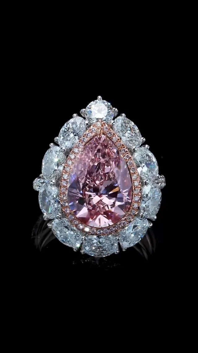 A Moussaieff pretty & charming 5.50 carats pear shape fancy pink diamond surrounded beautifully by the finest white diamonds. #moussaieffjewellers